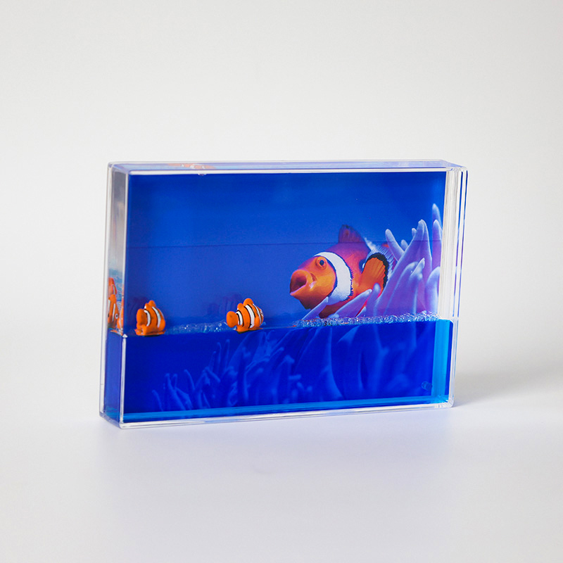 oil and blue water and 3D fish photo frame